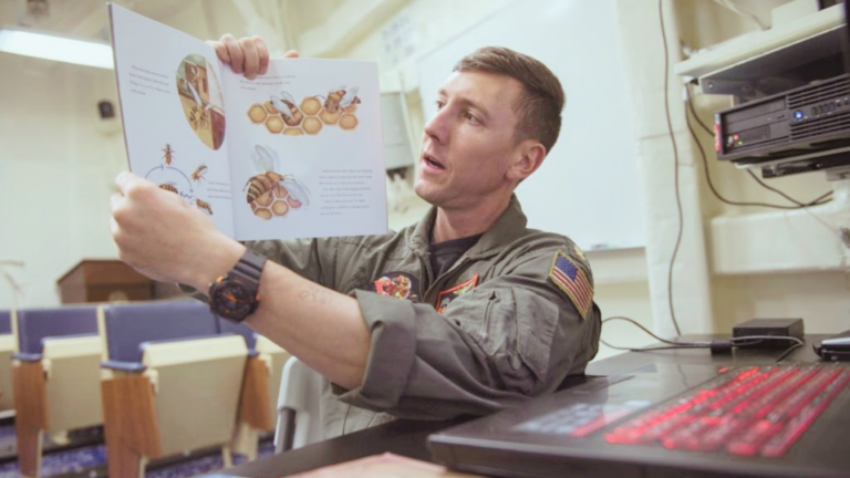 US Veteran holding a book